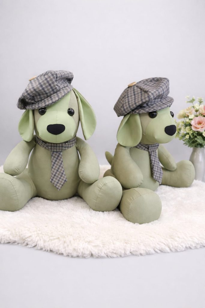 Two memory dogs wearing tweed flat caps and ties